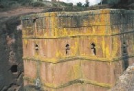 Pictures of Saint George church, Bieta Medhane Alem church, priests holding crosses and the monastic complex of roch-hewn churches, Lalibela